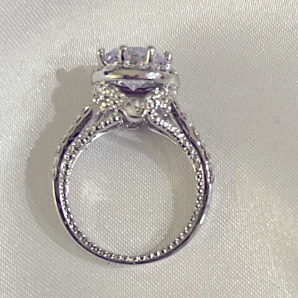 Beautiful Simulated Diamond Solitaire in a Silver  Setting. Sizes 7 & 8 - Picture 2 of 5